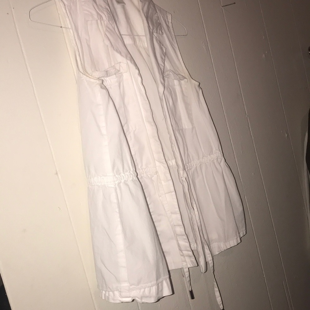 White dr type coat but with no sleeves